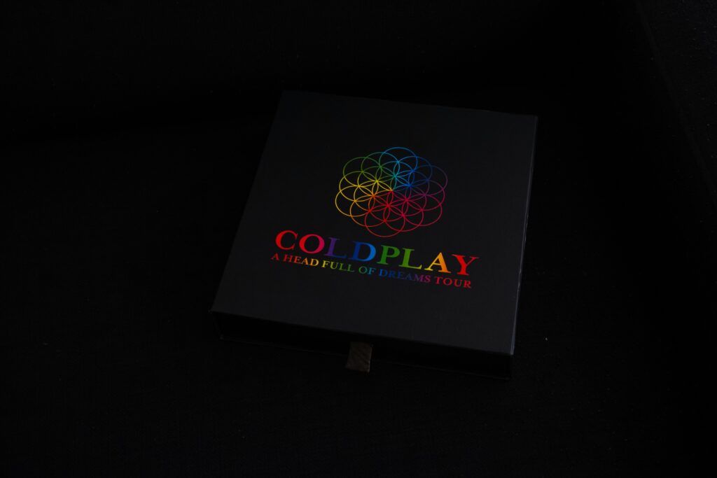 The Iconic Coldplay logo on a black canvas. Will your University Degree help you become the next Chris Martin?